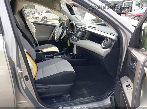 JTMWFREV8JJ188134 2018 TOYOTA LE Silver Вид салону спереду