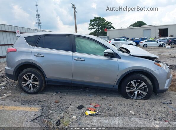 JTMWFREV8JJ188134 2018 TOYOTA LE Silver Вид задньої частини салону