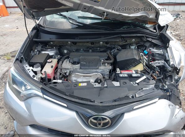 JTMWFREV8JJ188134 2018 TOYOTA LE Silver Вид ззаду