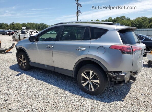 JTMWFREV9JD121881 2018 TOYOTA RAV4 Silver Rear left