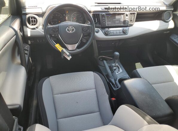 JTMWFREV9JD121881 2018 TOYOTA RAV4 Silver Dashboard view
