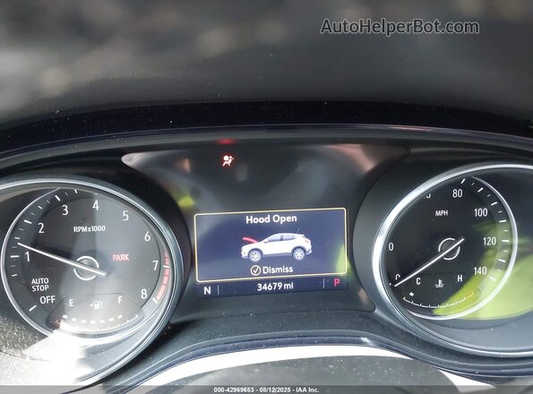KL4MMBS27PB130883 2023 BUICK ENCORE Orange Vista de los asientos traseros
