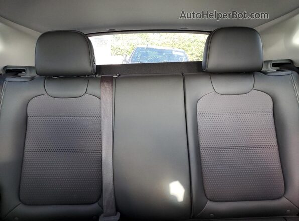 KL77LHEP0SC251819 2025 CHEVROLET TRAX Red Vista de los asientos traseros