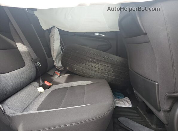 KL79MPSP6SB091388 2025 CHEVROLET TRAILBLAZER Maroon Rear interior view