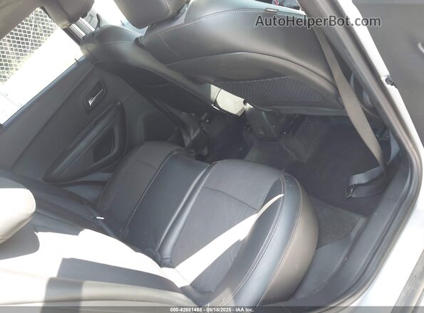 KL7CJPSB0JB707815 2018 CHEVROLET TRAX Silver Вид наклейки з VIN-кодом