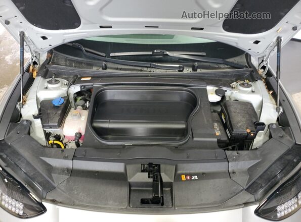 KMHM34AC5PA045637 2023 HYUNDAI IONIQ Серебряный Вид задней части салона