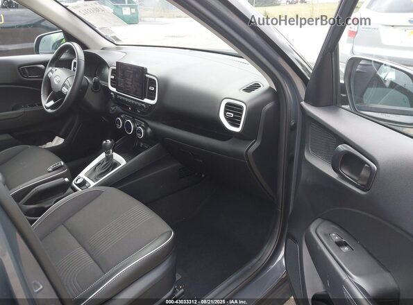 KMHRC8A32PU257701 2023 HYUNDAI VENUE Серый Вид салона спереди