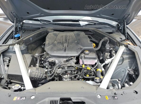 KMTG34SC9RU143105 2024 GENESIS G70 Серебряный Вид задней части салона
