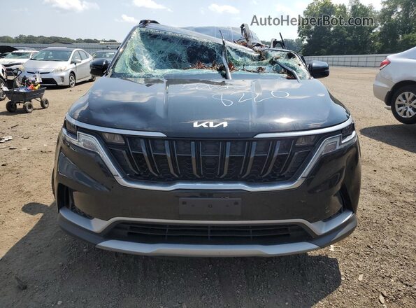 KNDNB4H34P6208220 2023 KIA CARNIVAL Black Front view