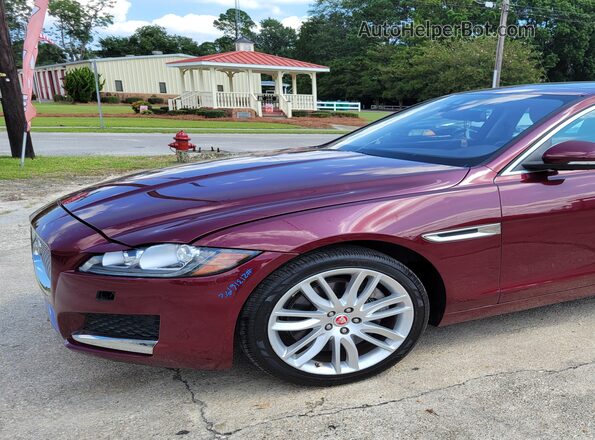 SAJBE4BV7GCY11587 2016 JAGUAR XF Burgundy Vista tres cuartos delantera izquierda