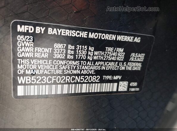 WB523CF02RCN52082 2024 BMW IX Black Vista del compartimento del motor
