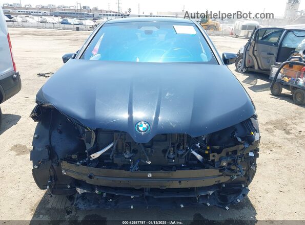 WB523CF02RCN52082 2024 BMW IX Black Vista interior trasera