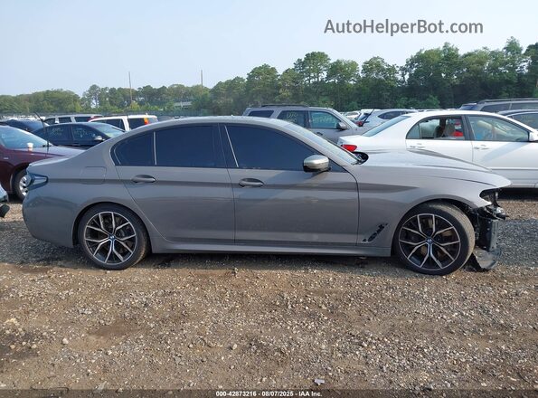 WBA13BK06MCF22835 2021 BMW M5 Серый Вид задней части салона
