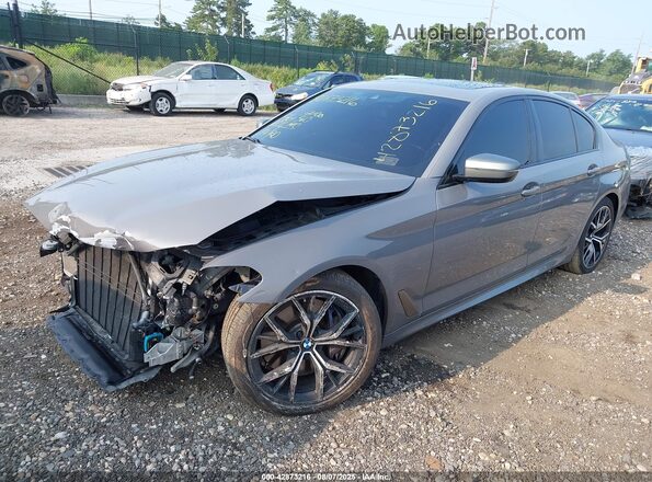 WBA13BK06MCF22835 2021 BMW M5 Серый Передняя левая четверть