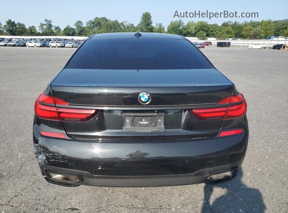 WBA7E4C50KGV28708 2019 BMW OTHER Black Вид ззаду