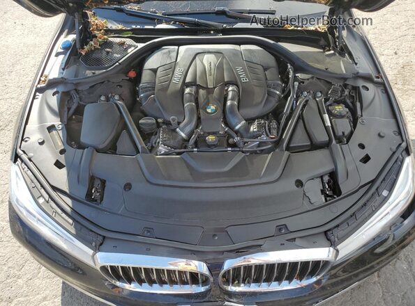 WBA7F2C55JG424568 2018 BMW OTHER Black Вид задньої частини салону