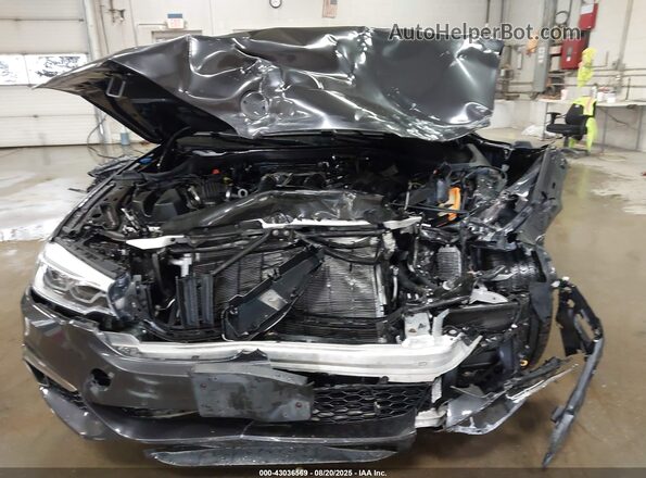 WBAJS7C00LBN96414 2020 BMW 5 SERIES Черный Вид спереди