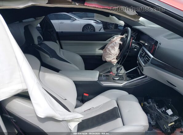 WBS33AZ00PCL82612 2023 BMW M4 Оранжевый Вид салона спереди