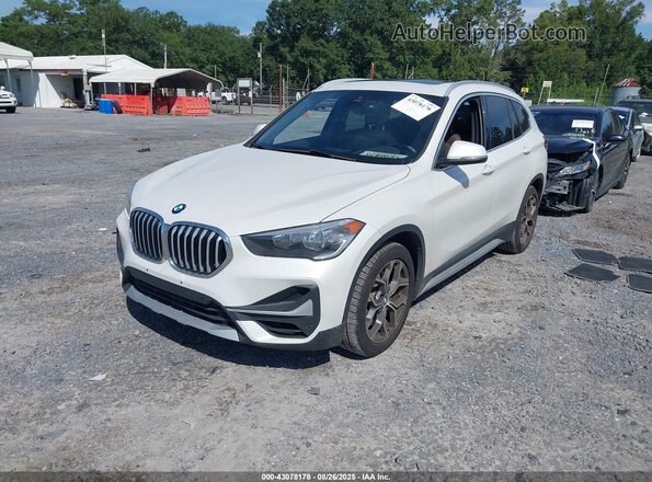 WBXJG9C00M5S45019 2021 BMW X1 Белый Передняя левая четверть