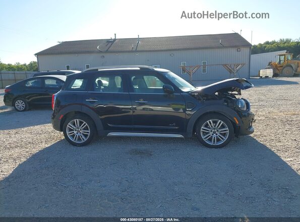 WMZYW5C09L3L06966 2020 MINI COOPER Black Rear interior view