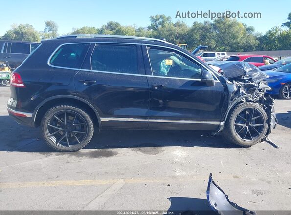 WVGEP9BP8GD000603 2016 VOLKSWAGEN TOUAREG Черный Вид задней части салона