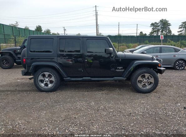 1C4BJWEG9GL136764 2016 JEEP WRANGLER UNLIMITED Black Widok wnętrza z tyłu