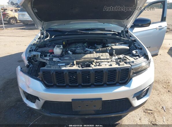 1C4RJHAG0PC625845 2023 JEEP GRAND CHEROKEE Серебряный Вид сзади