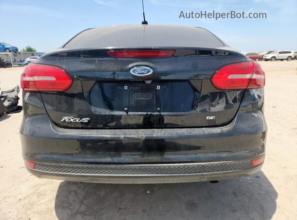 1FADP3F26JL315382 2018 FORD FOCUS Black Vista trasera