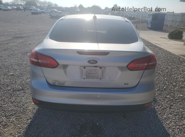 1FADP3F28JL235338 2018 FORD FOCUS Silver Rear view