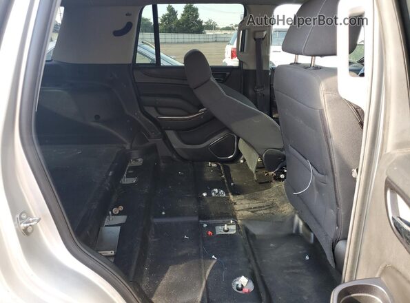 1GNSKDEC2JR296611 2018 CHEVROLET TAHOE Silver Widok wnętrza z tyłu