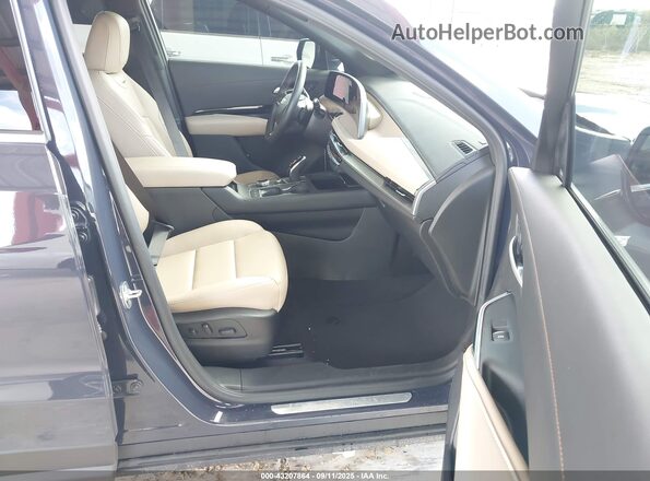 1GYAZAR45RF202276 2024 CADILLAC XT4 Синий Вид салона спереди