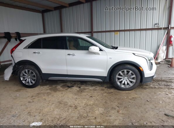 1GYFZDR40MF011378 2021 CADILLAC XT4 Белый Вид задней части салона