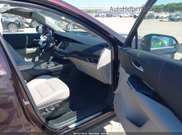 1GYFZDR41LF111066 2020 CADILLAC XT4 Фиолетовый Вид салона спереди