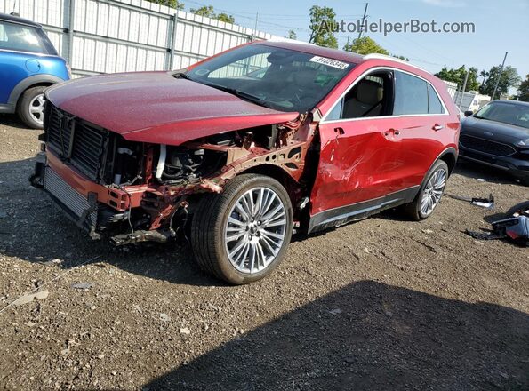 1GYFZDR4XRF140462 2024 CADILLAC XT4 Red წინა მარცხენა ხედი სამი მეოთხედიდან