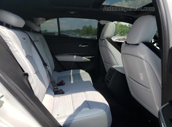 1GYFZFR47RF163449 2024 CADILLAC XT4 White Vista interior trasera