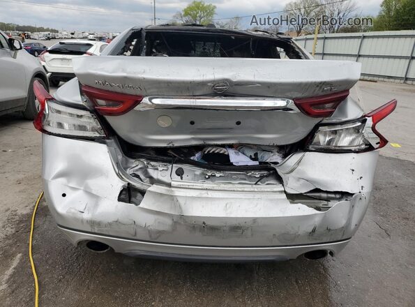 1N4AA6AP5JC378174 2018 NISSAN MAXIMA Silver Вид ззаду