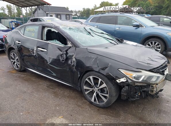 1N4AA6AP7JC368729 2018 NISSAN MAXIMA Черный Вид задней части салона