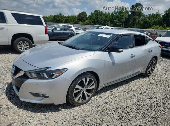 1N4AA6AP8JC384552 2018 NISSAN MAXIMA Серебряный Передняя левая четверть
