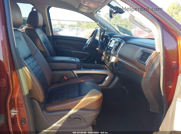 1N6BA1F47JN515374 2019 NISSAN TITAN XD Brown Widok wnętrza z przodu