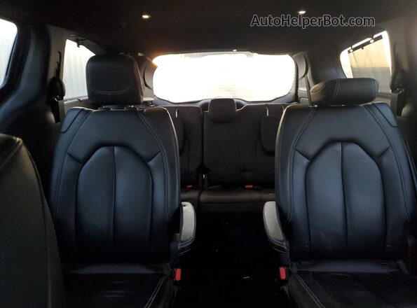 2C4RC1EG1JR226713 2018 CHRYSLER PACIFICA Black Rear seats view