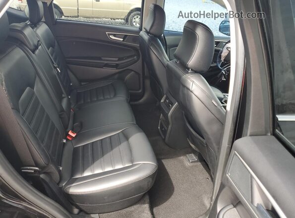2FMPK4J92RBA91650 2024 FORD EDGE Black Widok wnętrza z tyłu