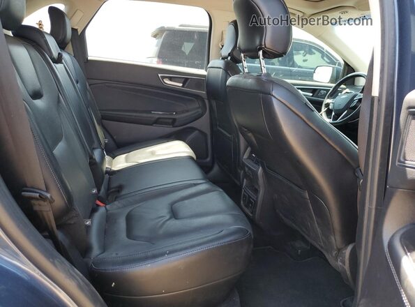 2FMPK4K9XJBC23279 2018 FORD EDGE Синий Вид задней части салона