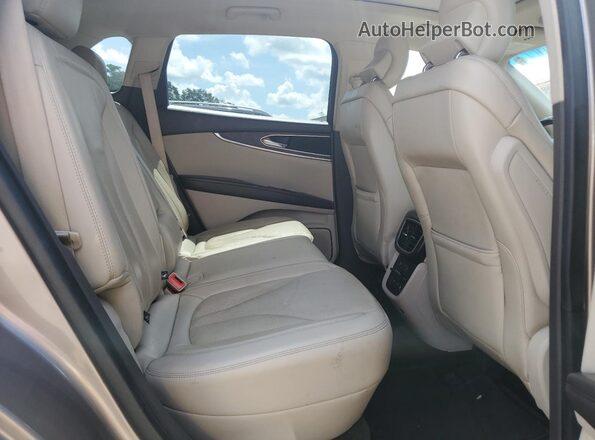 2LMPJ6LR1JBL42470 2018 LINCOLN MKX Gold Vista interior trasera