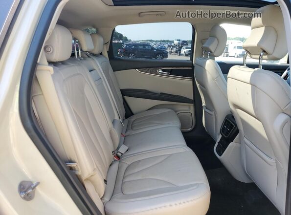 2LMPJ6LRXJBL29121 2018 LINCOLN MKX Бежевый Вид задней части салона