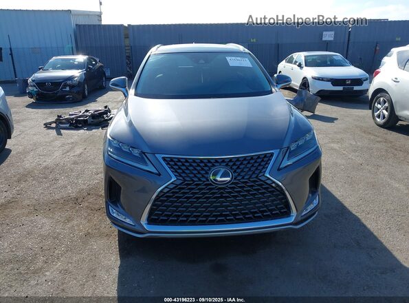 2T2JGMDAXLC048847 2020 LEXUS RX 450H Gray Vista interior trasera