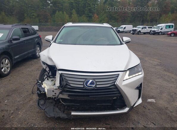 2T2ZFMCA1GC001414 2016 LEXUS RX 450H Белый Вид задней части салона