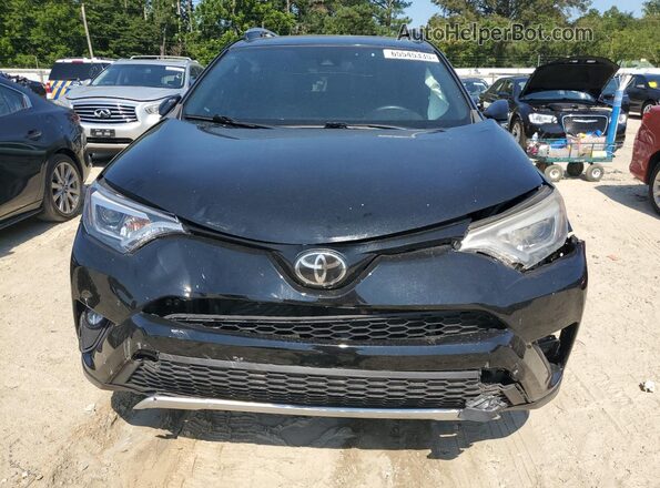 2T3JFREV4JW762174 2018 TOYOTA RAV4 Black Widok z przodu