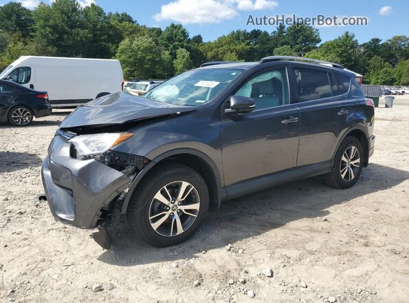 2T3RFREV4JW849611 2018 TOYOTA RAV4 Gray Vista tres cuartos delantera izquierda