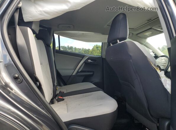 2T3RFREV4JW849611 2018 TOYOTA RAV4 Gray Vista interior trasera