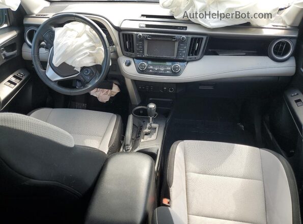 2T3RFREV4JW849611 2018 TOYOTA RAV4 Gray Vista del salpicadero